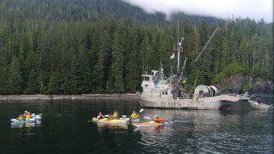 Fishing boats and kayaks