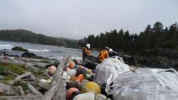 Lift tenders at one of dozens of sites where marine debris is cached on Vancouver Island's West Coast