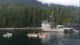 Fishing boat and kayaks. Photo: Marie OShaughnessy