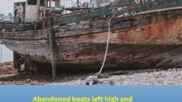 abandoned boat image on beach with title below Abandoned boats left high and dry on west coast as funding cuts deepen